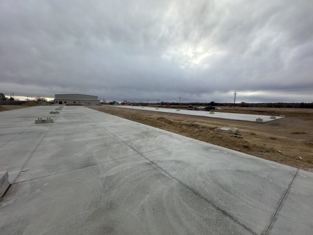 Large Finished Slab Foundation Commercial Construction Site